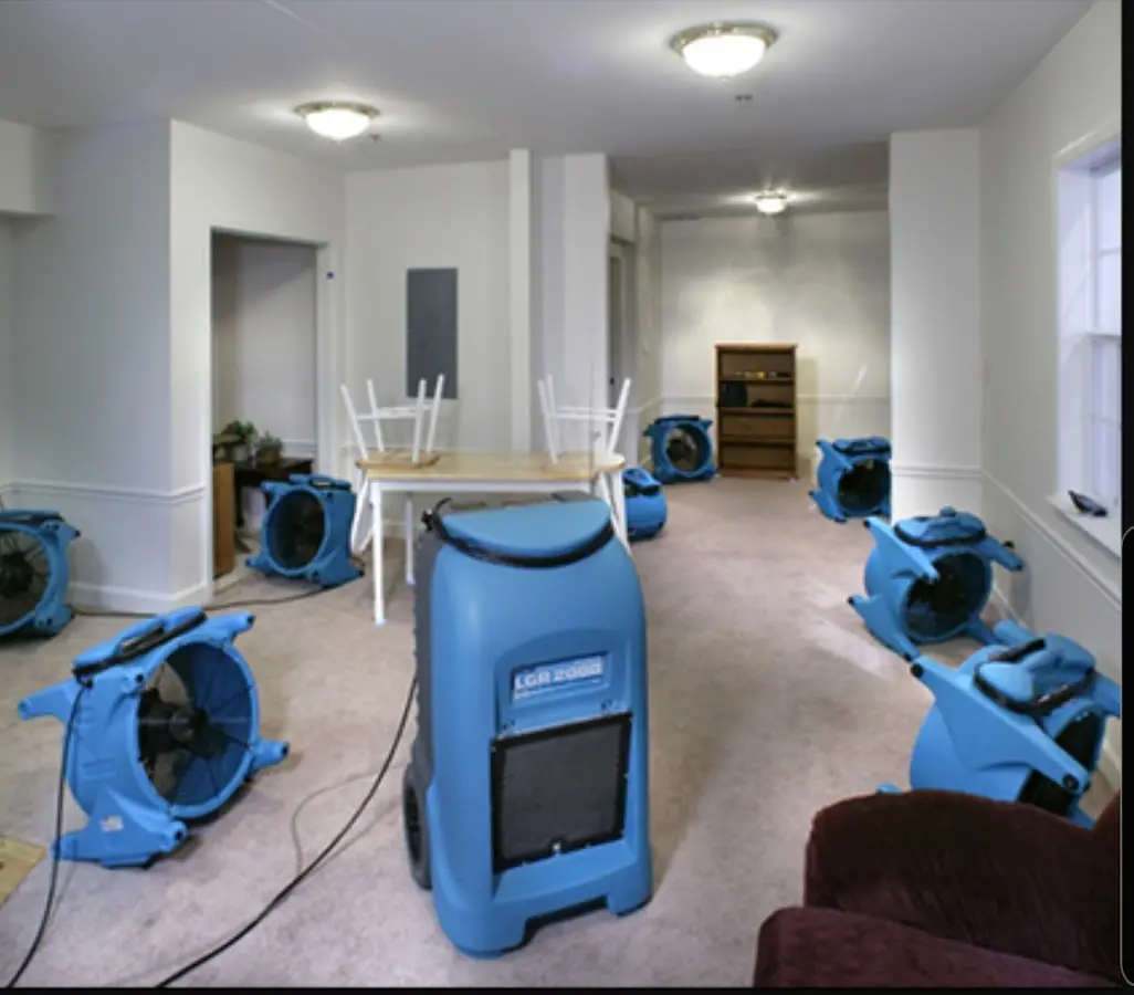 Air movers and dehumidifier setup for Water Damage Restoration in Ligonier